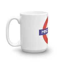 "MIND THE GAPE" Mug